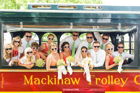 Bridal party rides the Mackinaw Trolley in sunglasses