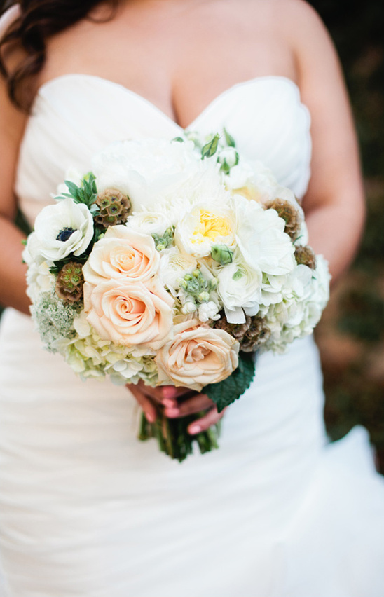 peach and white wedding bouquet by April Flowers