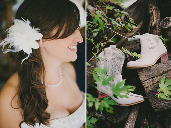 Bride smiling, with a flower and boots, rustic wedding concept