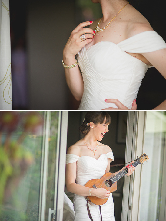 Bride in wedding dress with ukulele and jewelry smiling cheerfully