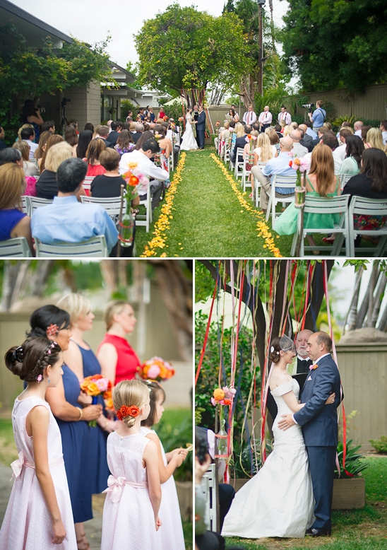 Outdoor wedding ceremony with bride, groom, and guests