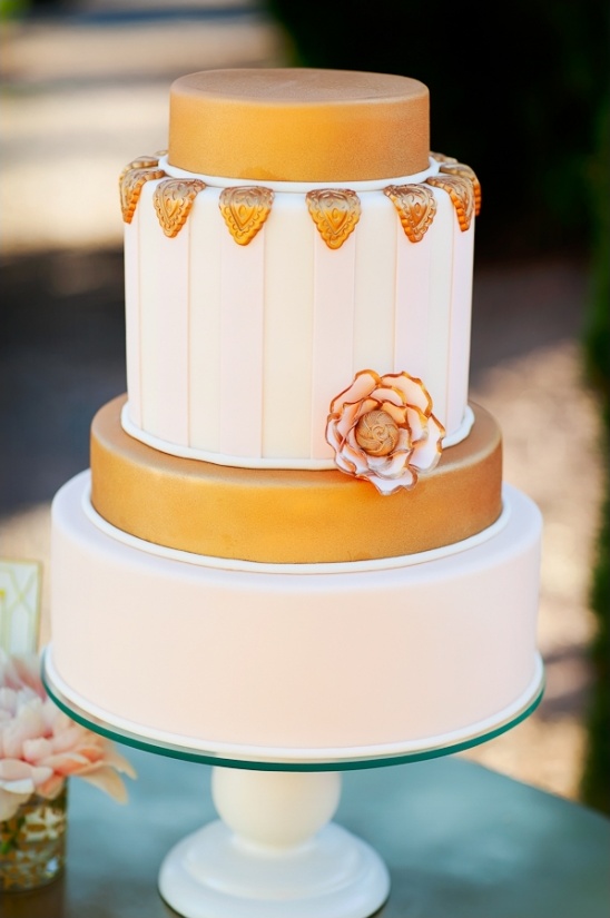 Three tiered wedding cake, gold and blush pink