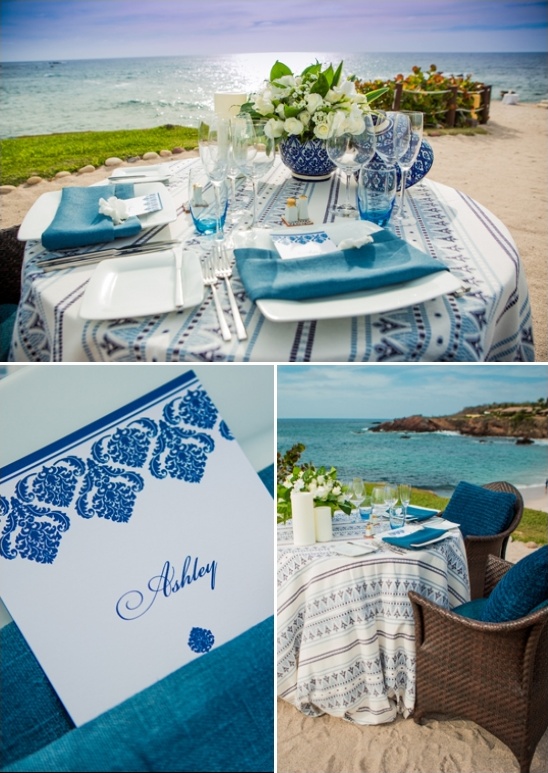 Beachside wedding table setting with blue and white details