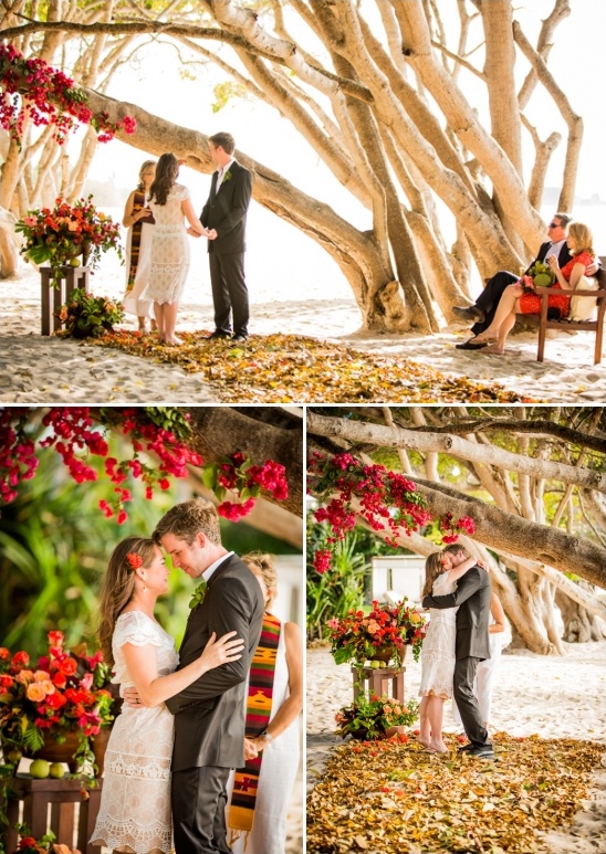 Beach wedding ceremony under the shade of a beautiful tree