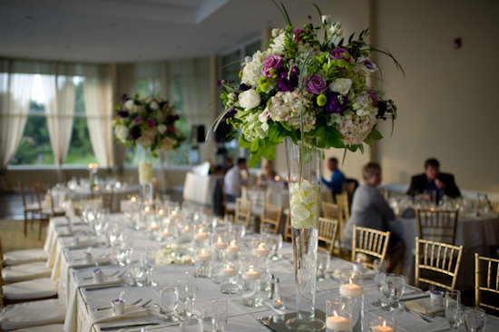Elegant wedding reception with floral centerpieces and candles