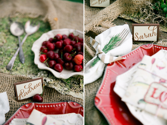 Elegant table setting with cherries and place cards for wedding decor
