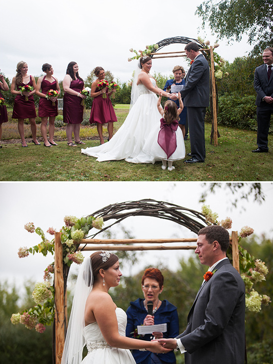 Wedding ceremony with a bride, groom, bridesmaids, and flower girl