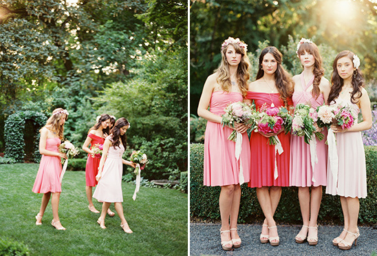 Bridesmaids in pink dresses with bouquets for a garden wedding