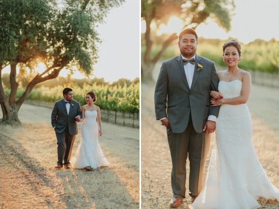 Newlywed couple walking together on their wedding day in a vineyard