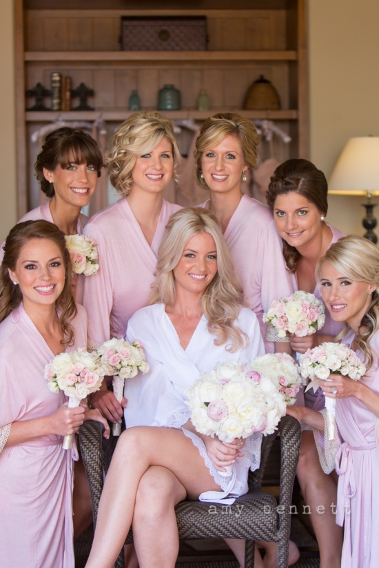Bride and bridesmaids in pink robes