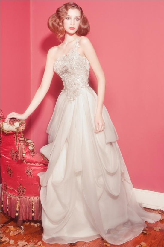 Woman in a one shoulder ethereal wedding dress