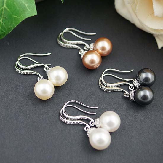 Elegant pearl dangle earrings in silver, black, and champagne