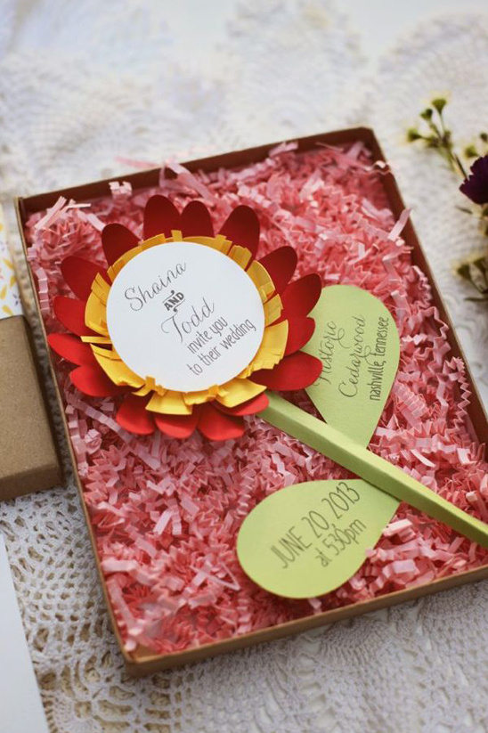 Shaina & Todd's wedding invitation in a flower box