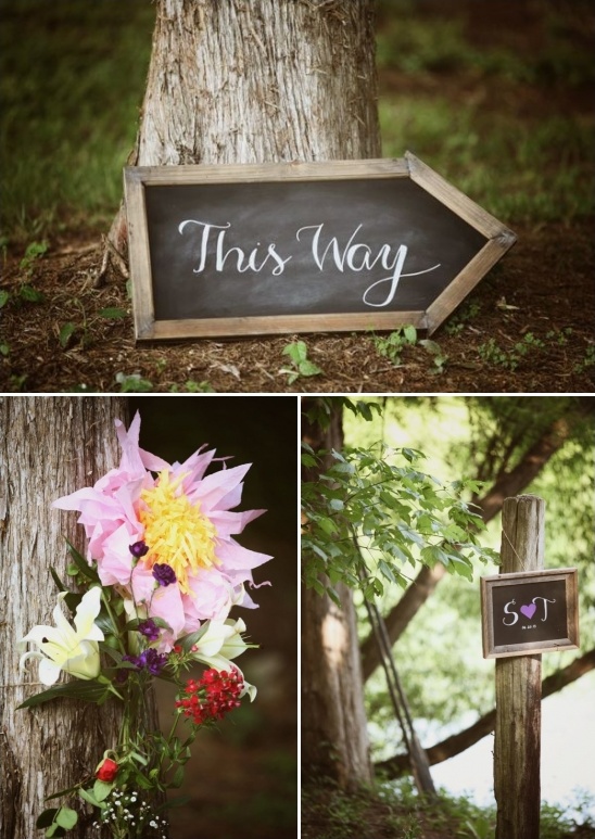 Rustic wooden wedding signpost pointing the way