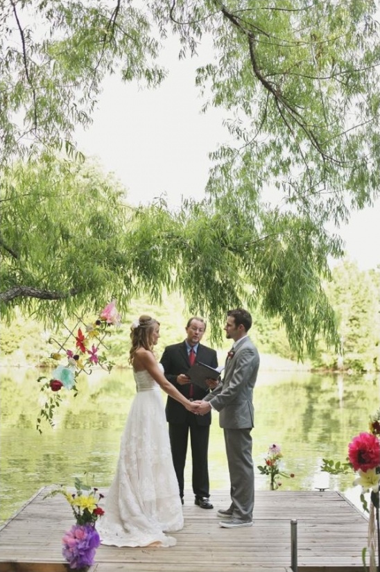 Outdoor wedding ceremony by the lake