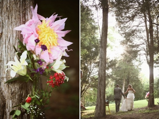 Wedding flowers and couple walking in woods