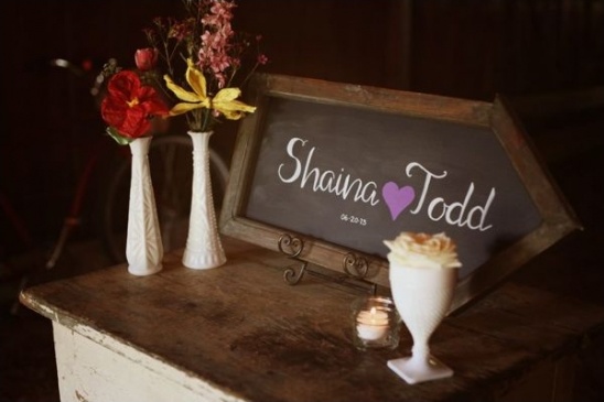 Shaina Todd wedding sign with flowers