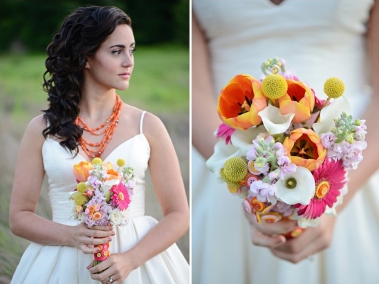 Bride with colorful wedding bouquet and orange necklace