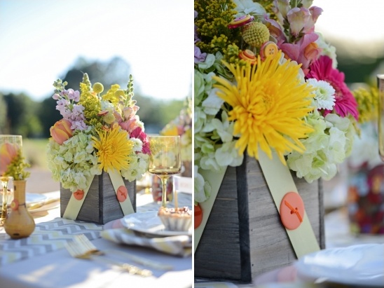 Colorful flower arrangement in wooden box centerpiece