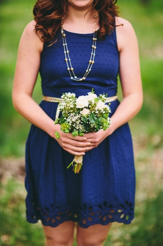 blue bridesmaid dress and white bouquet