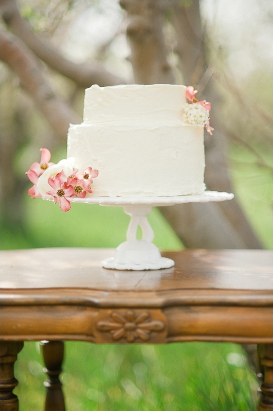 white wedding cake with floral decorations