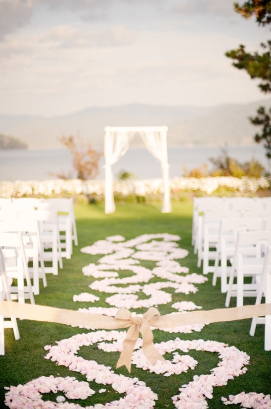 flower petal covered ceremony aisle