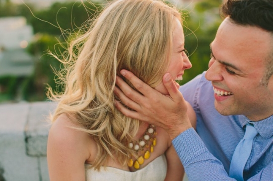 Couple laughing close up, happy lovers