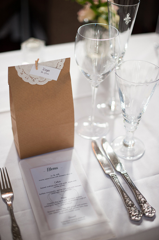 Wedding menu and favor bag at place setting