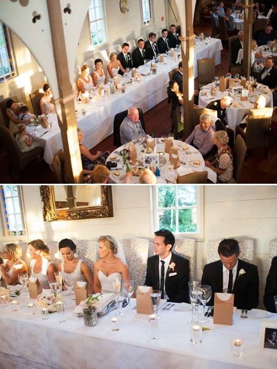 Wedding reception guests seated at long tables