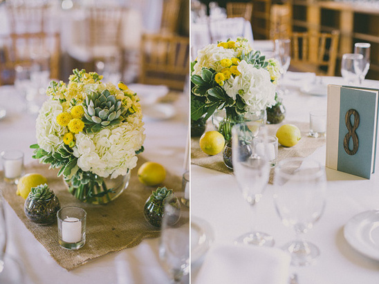 Elegant wedding centerpiece with flowers and lemons
