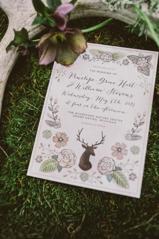 Rustic wedding invitation with deer and floral accents