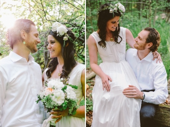 Happy couple in wedding attire embracing in nature