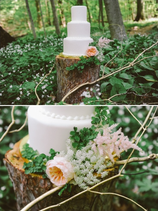 tree stump as outdoor cake table