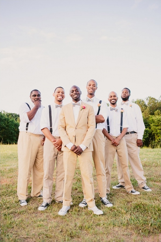 Groom and groomsmen in tan suits and converse sneakers