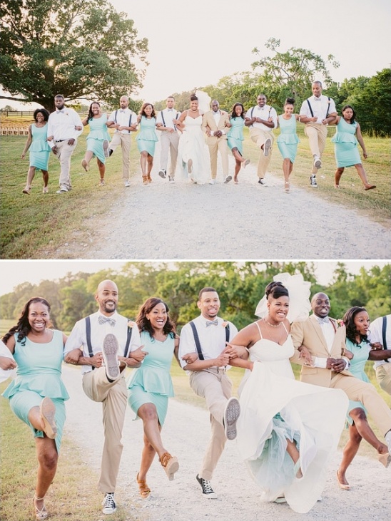 Wedding party joyfully kicks up heels in mint dresses