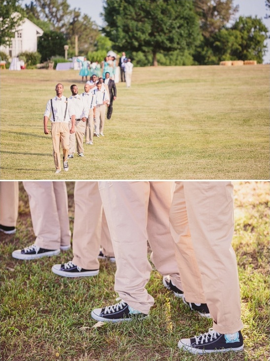 Groomsmen in beige pants and Converse shoes walking