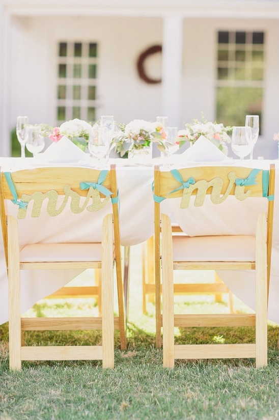 Wedding chairs with Mr and Mrs signs