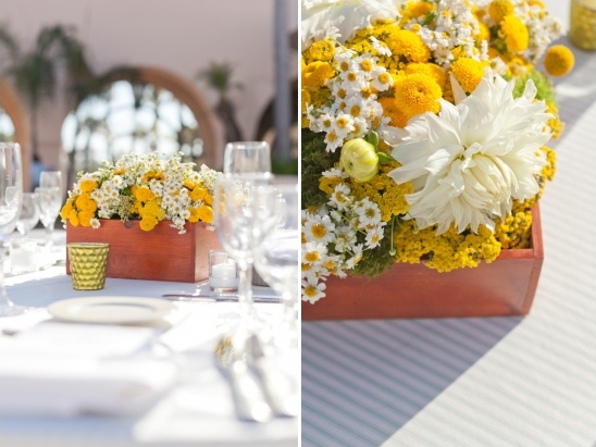 Floral centerpiece with yellow and white flowers in box