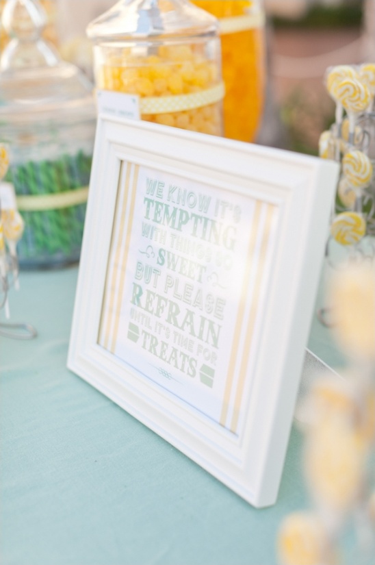 mint and yellow candy bar sign