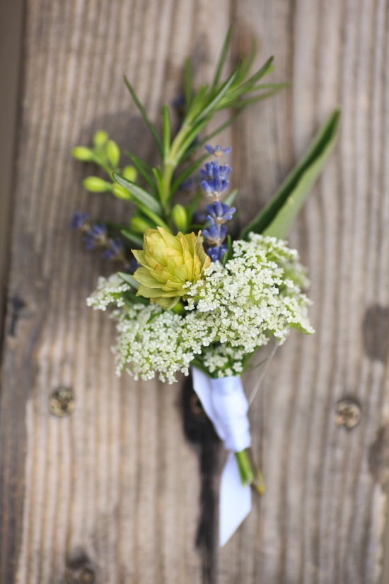 Floral boutonniere with lavender, rosemary, and wildflowers
