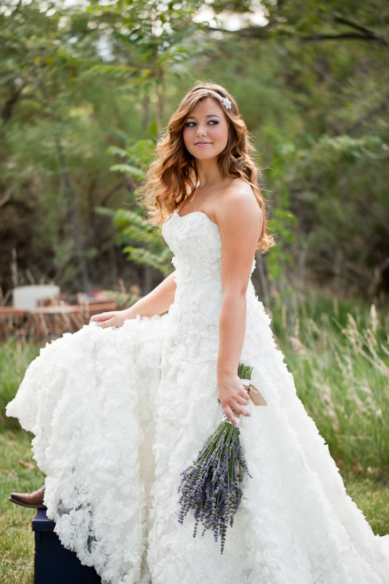 Beautiful bride in a white ruffled wedding dress