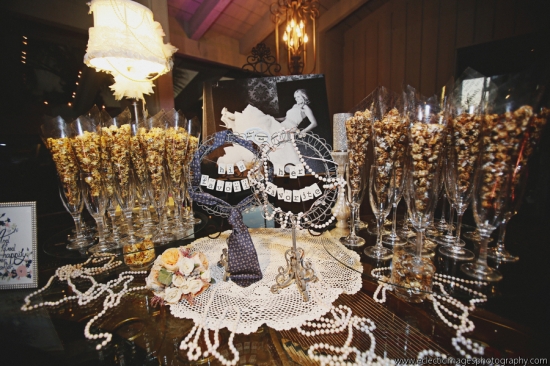Elegant wedding reception table with popcorn and vintage decor