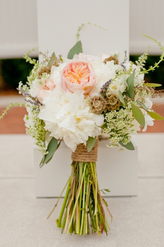 Elegant bridal bouquet with white and peach peonies