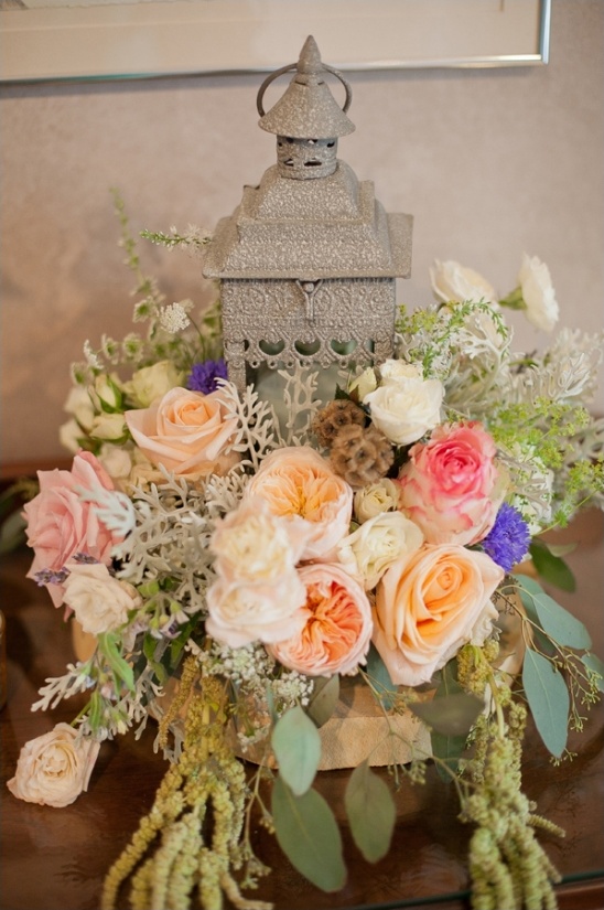Elegant floral centerpiece with vintage lantern detail