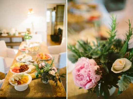 Elegant table setting with fruit and floral centerpiece
