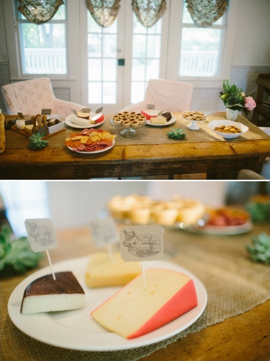 Rustic wedding cheese board with assorted meats and snacks