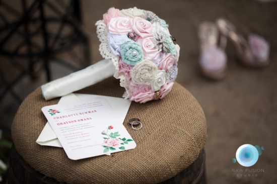 Wedding bouquet invitation and rings detail shot