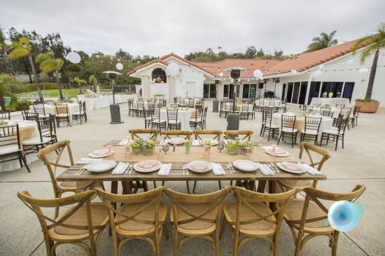Outdoor wedding reception table setting and decor