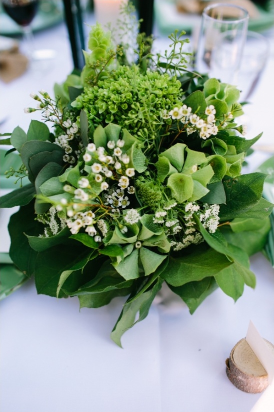 green floral centerpiece by glasswing floral