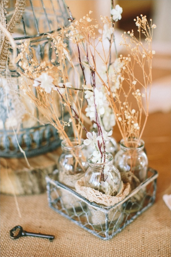 Rustic dried flower arrangement in jars